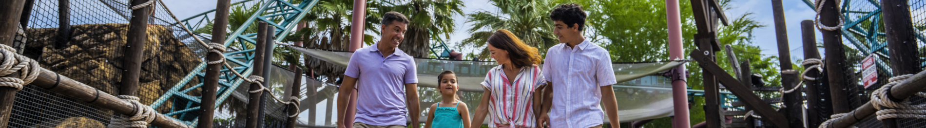 Family in front of Cobra's Curse at Busch Gardens Tampa Bay