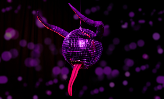 Disco ball with long tongue and devil horns