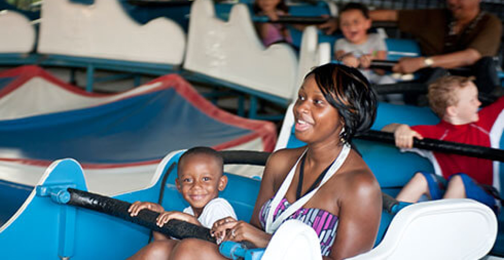 A child and an adult on Elephant Run at Busch Gardens Williamsburg