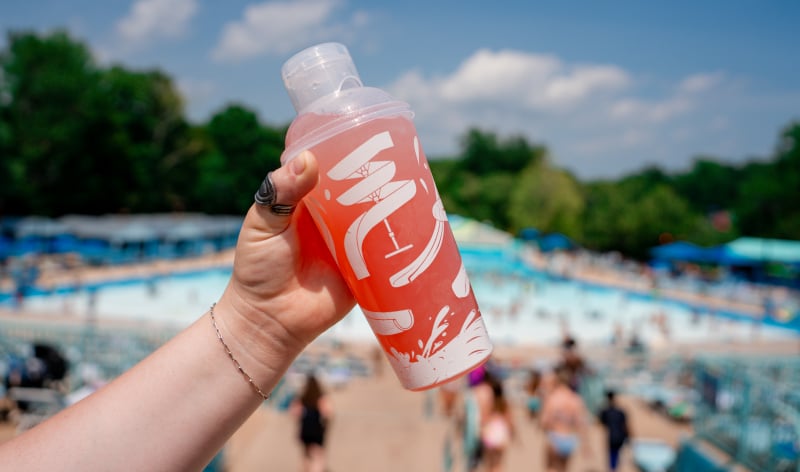 Souvenir cocktail shaker in front of wave pool